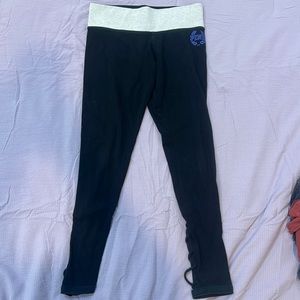 ~ cross cross on the back side of the legs~ blue colored size on the front~